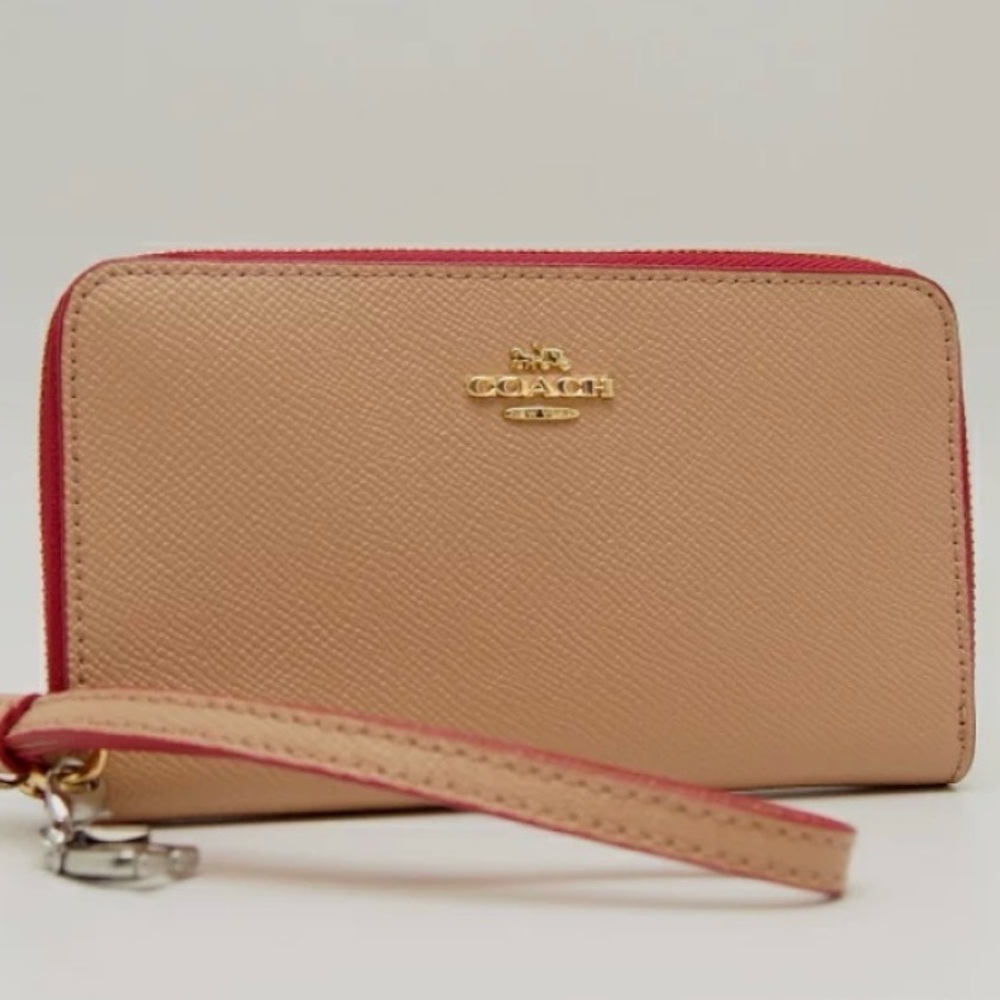 NWT COACH IMA55 PHONE WALLET WITH CHARM CHALK IN TAN AND PINK F29943